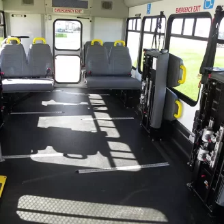 The inside of the The We Care Bus, used for transporting the elderly and those with disabilities, with its seats up